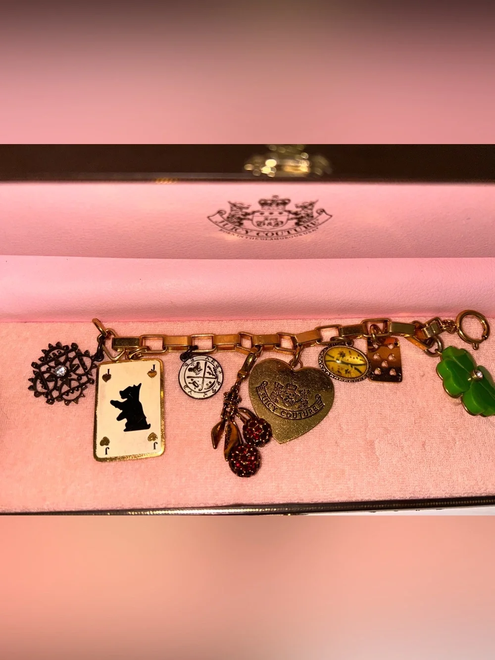 Juicy Couture Pink Charm Bracelet with Antique Gold Accents